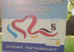 Banner mit der Aufschrift Les Sables - Schwabach