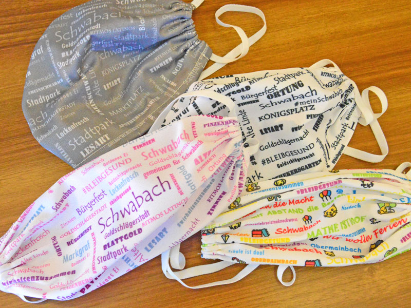 Masken mit Schwabach-Schriftzug